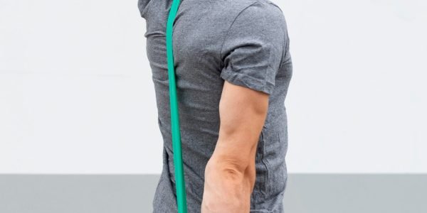 side-view-man-training-with-elastic-band